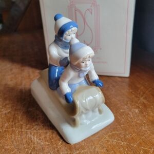 Vintage Paul Sebastian Porcelain Mexico Children Sledding Winter Snow Tobaggan.